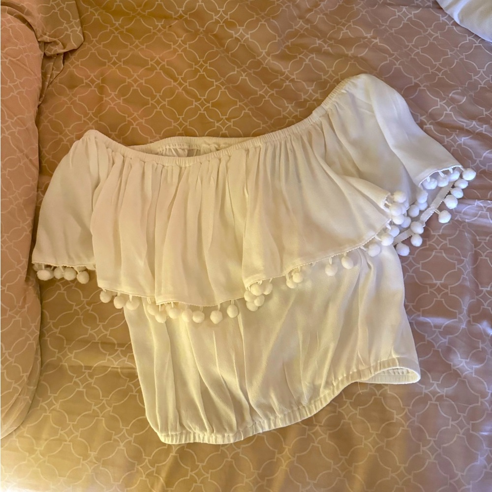 White off the shoulder pom pom shirt